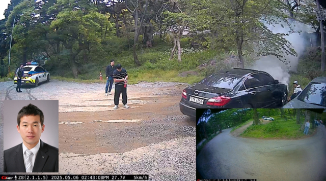 지난 6일 부석사 인근 주차장에서 발생한 차량 화재 현장에서 서산소방서 소속 이원희 소방위가 신속하게 초기 대응하는 모습. 서산소방서 제공