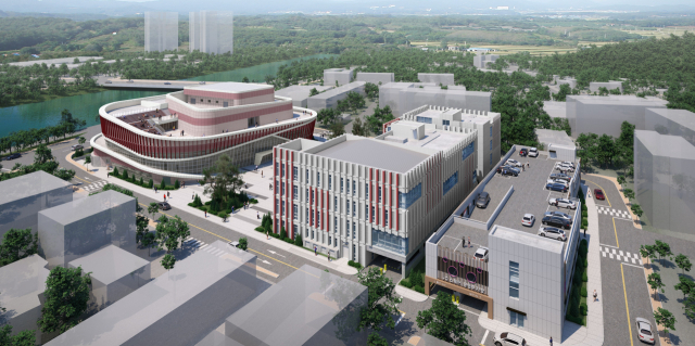 진천읍 읍내리 전통시장 이전부지에 들어서는 문화예술회관과 복합커뮤니티센터, 도시재생어울림센터 통합조감도.진천군 제공